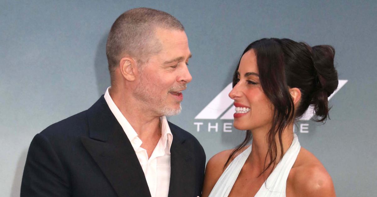 brad pitt ines de ramon hold hands red carpet f premiere nyc photos