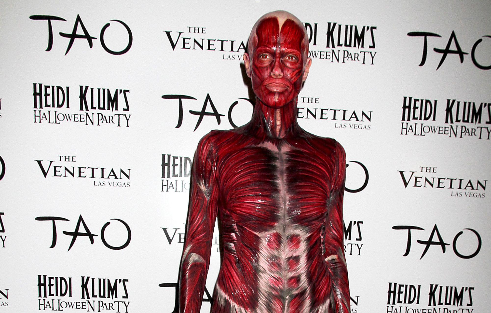 heidi klum poses nude preps halloween bash