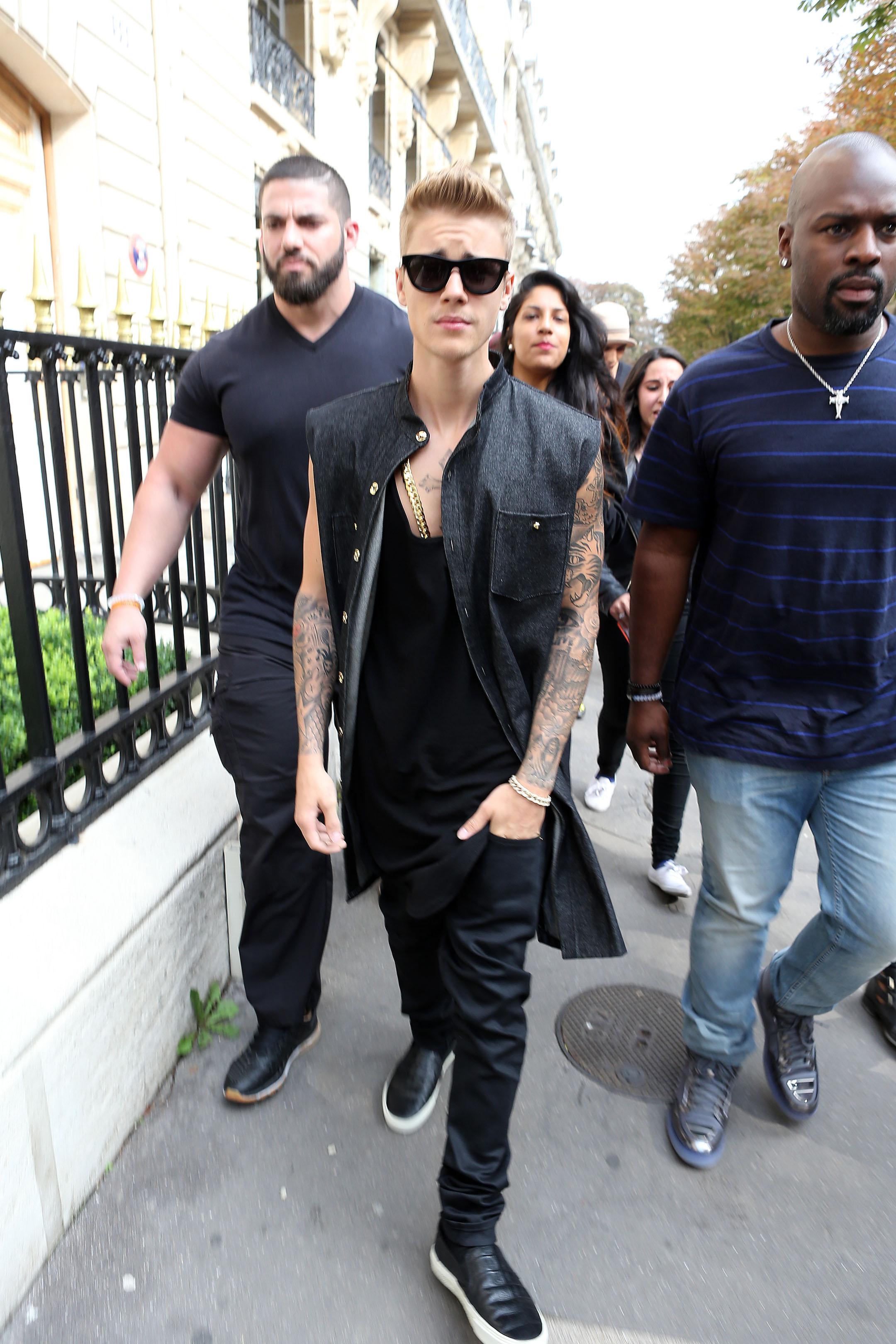 Justin Bieber shopping at Yves Saint Laurent in Paris