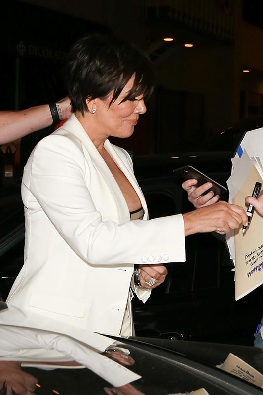 Kris Jenner shows some skin in a sheer bra at Craig&#8217;s