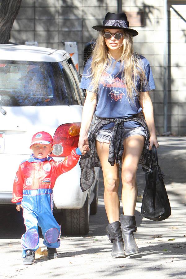 Fergie and her tiny racing driver look ready for Halloween