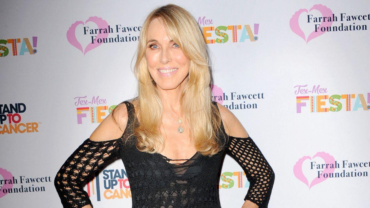 Image of Stewart in a black dress.