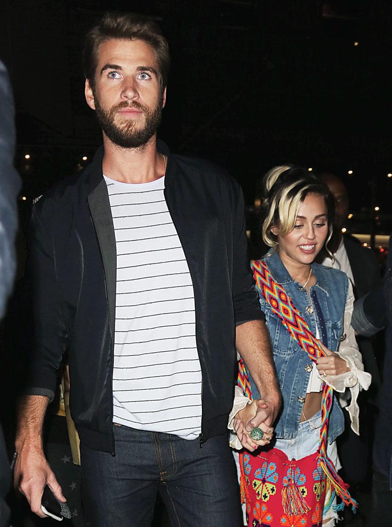 miley cyrus liam hemsworth wedding stand off 02