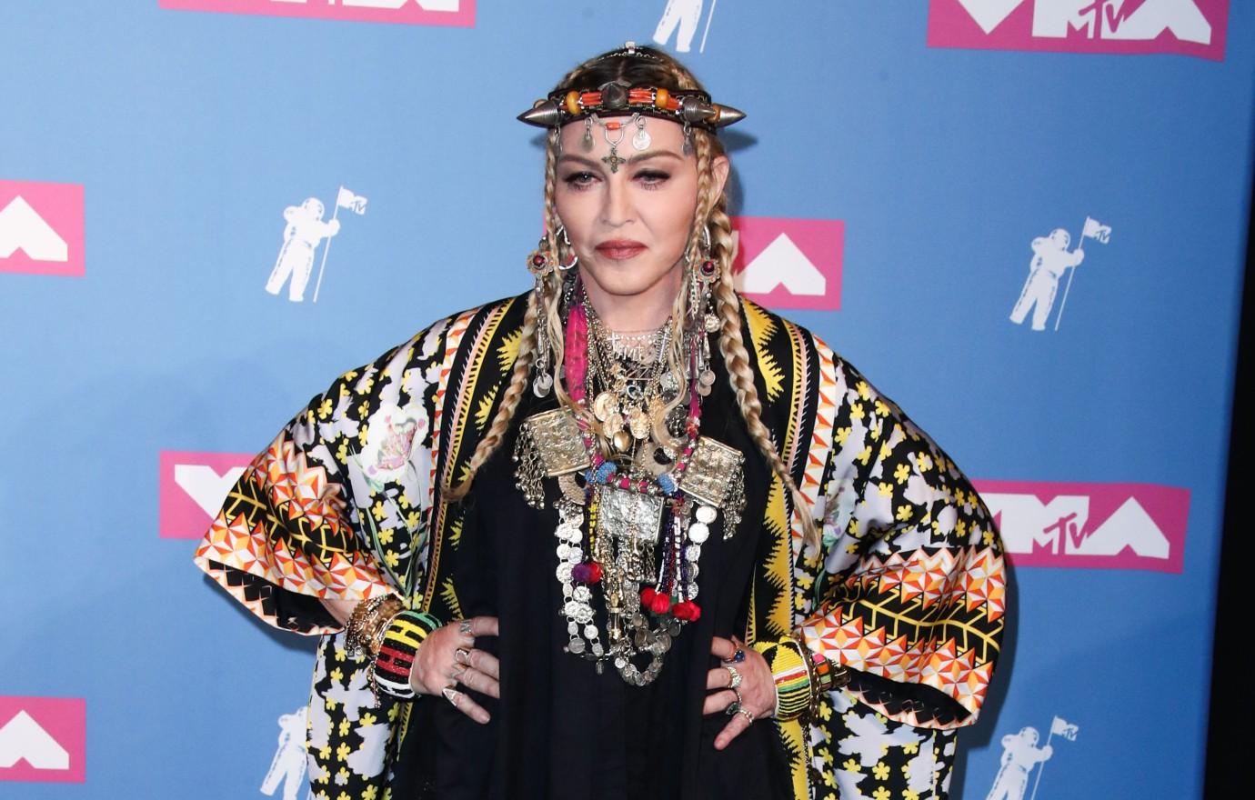 madonna ditches pants fishnet stockings miami art basel exhibit