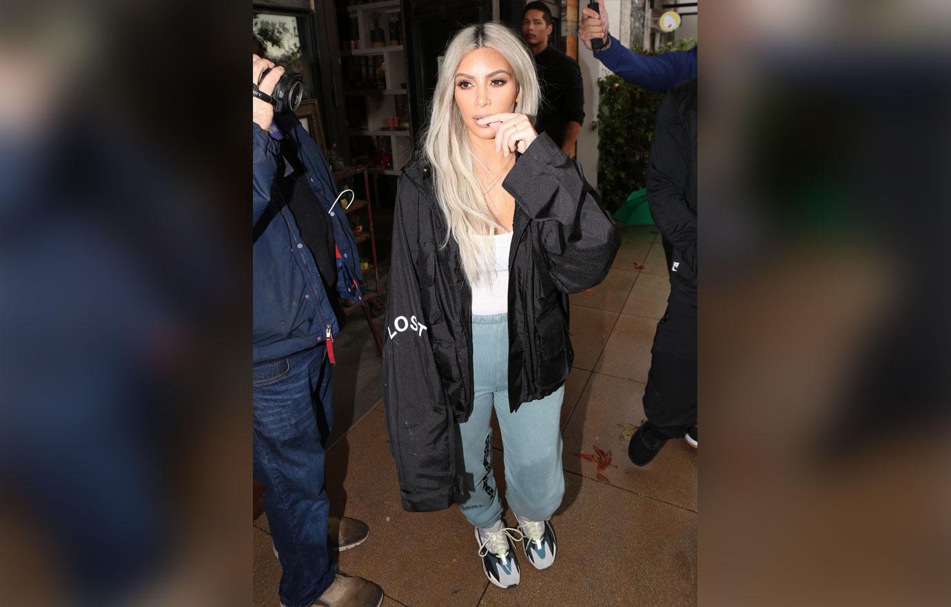 No heels! Kim Kardashian looks casual in a big Yeezy jacket