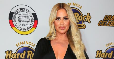 Kim Zolciak Wearing a Black Dress on a Red Carpet