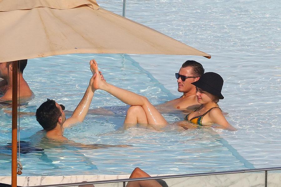 Cara delevingne lounges pool rio 05