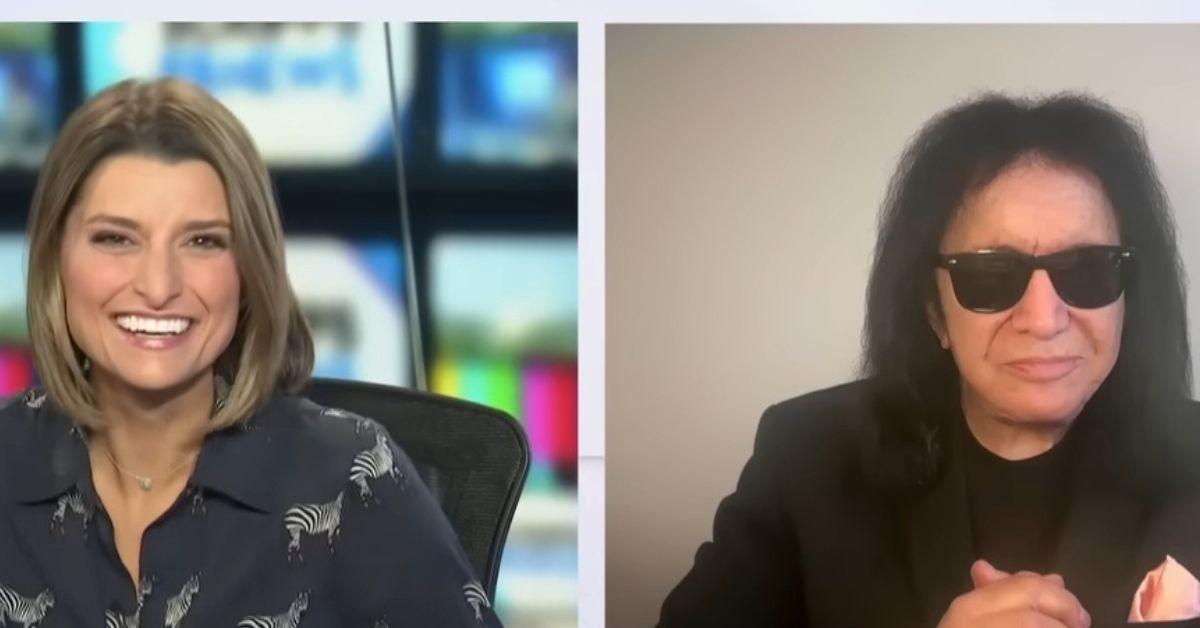 Photo of Maritsa Georgiou and Gene Simmons