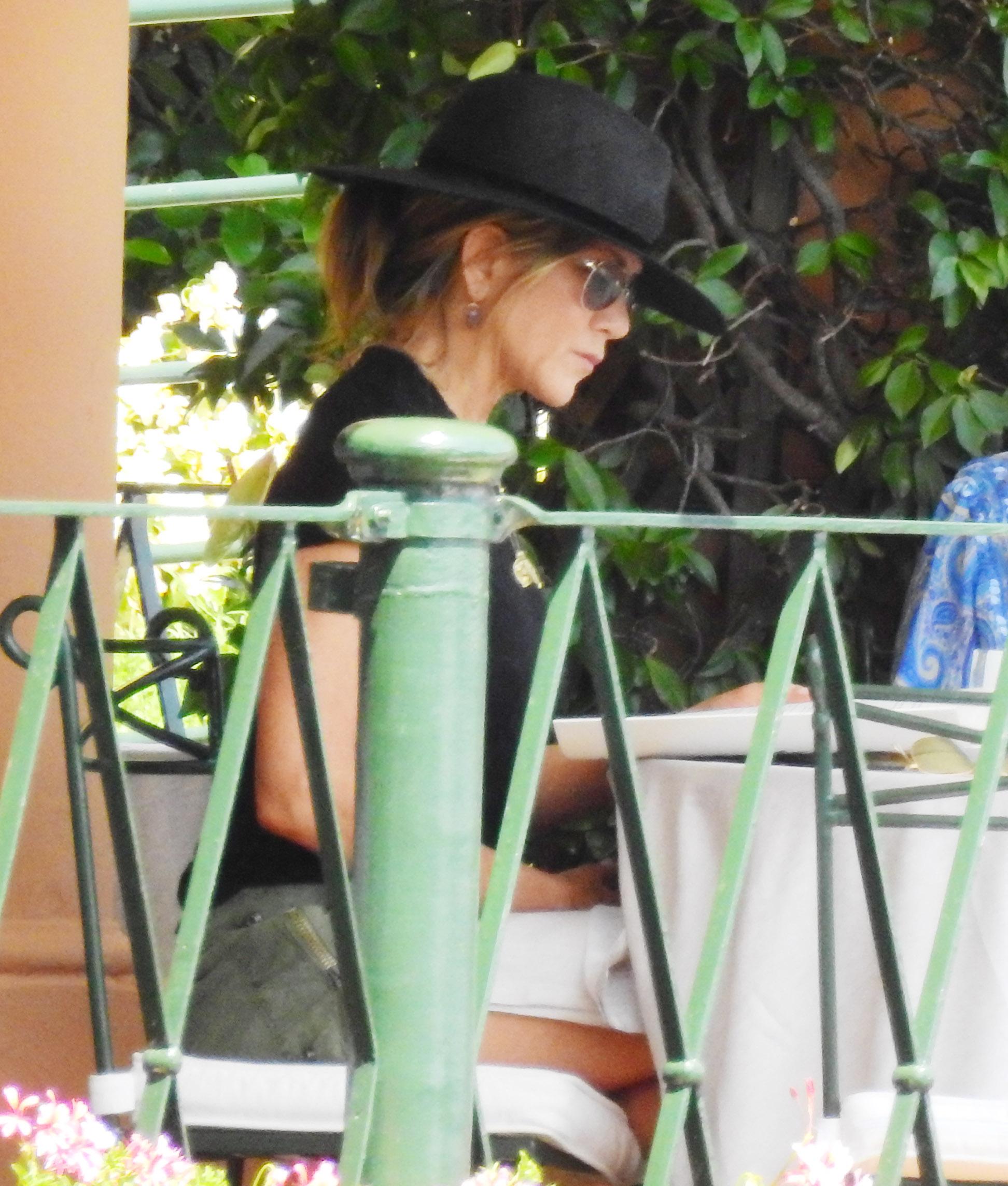 Jennifer Aniston having lunch with a friend in Portofino