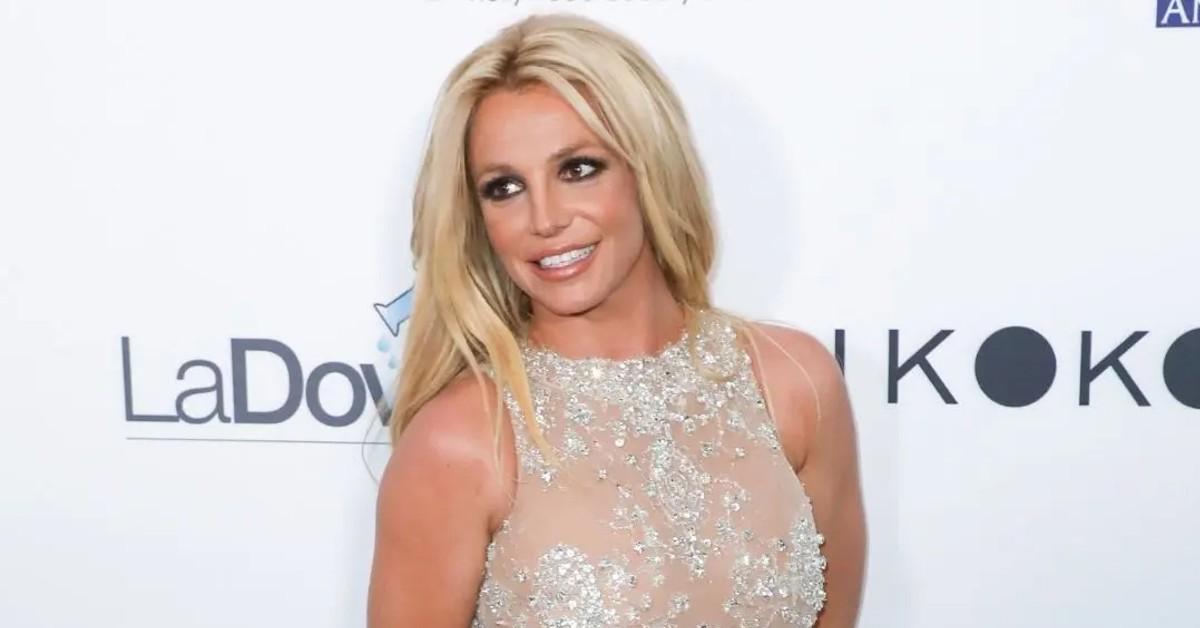 Britney Spears' boobs completely spill out of her tight red dress at X  Factor auditions - OK! Magazine