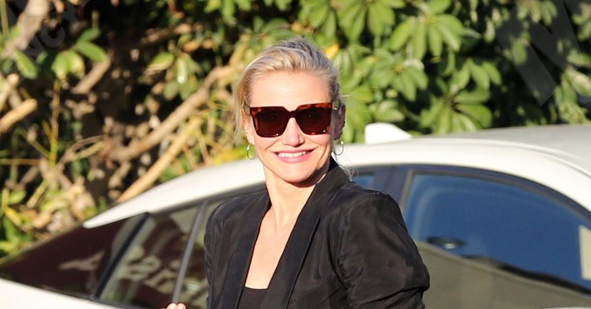 Cameron Diaz flashes some boob and suffers nip slip on the set