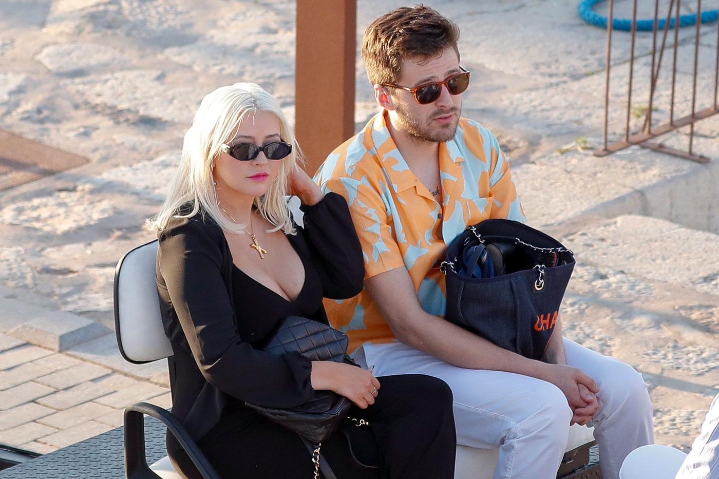 EXCLUSIVE: Christina Aguilera and Karolina Kurkova arriving at a port in Ibiza to board a yacht