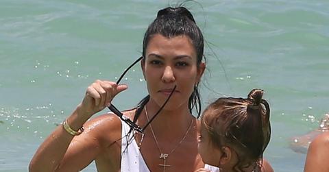 Hot mama Kourtney Kardashian hits the beach