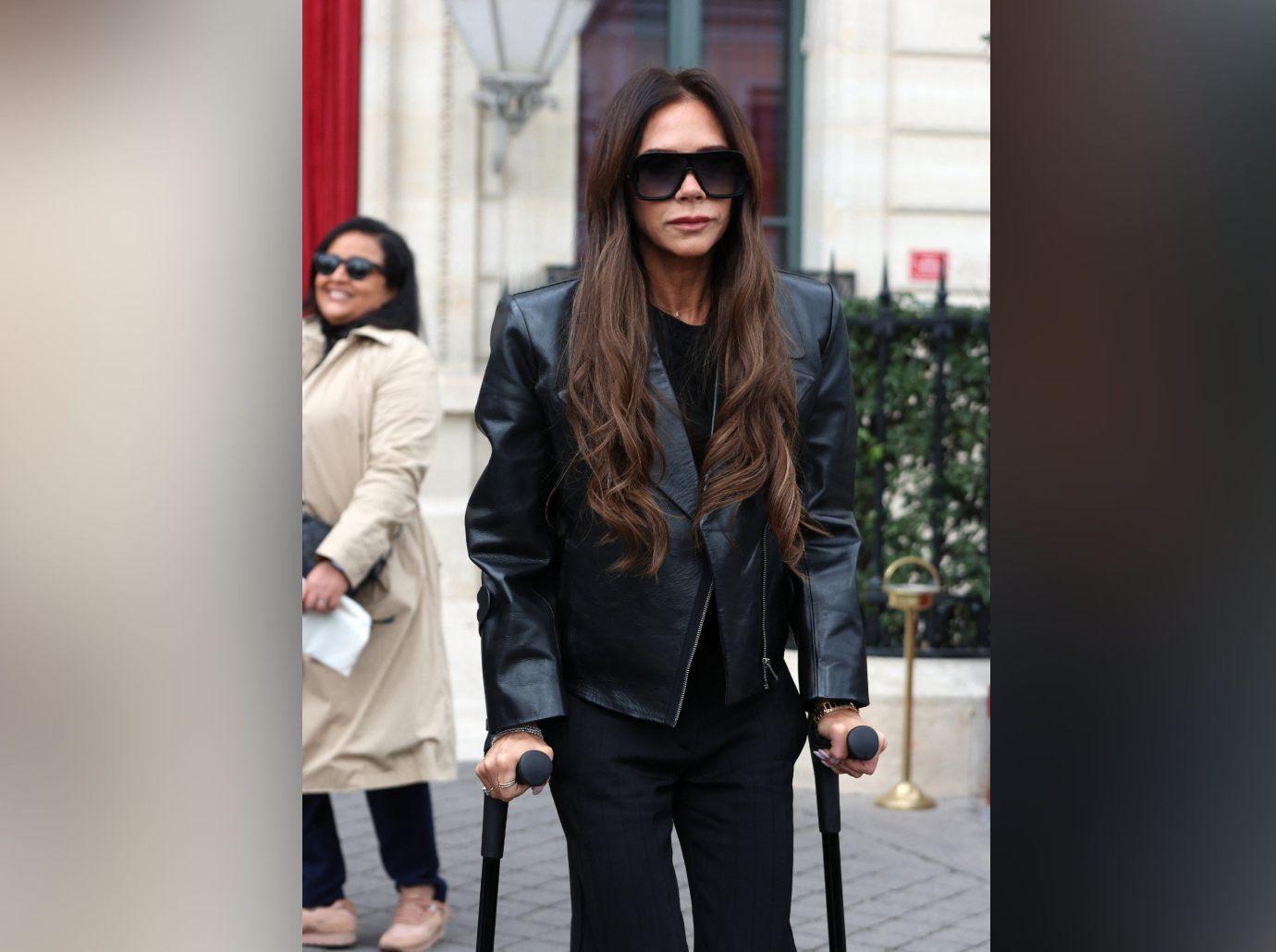 Why is Victoria Beckham using crutches?