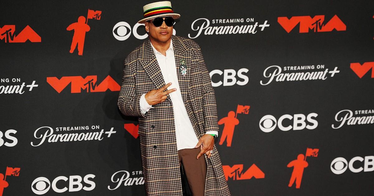Image of the 2025 MTV VMAs host, LL Cool J, looked fashionable in a plaid coat.