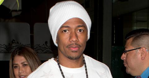Nick Cannon wearing a white t shirt and a white beanie with track pants on was seen leaving the very upmarket ‘Mr. Chow’ Restaurant in Beverly Hills, CA