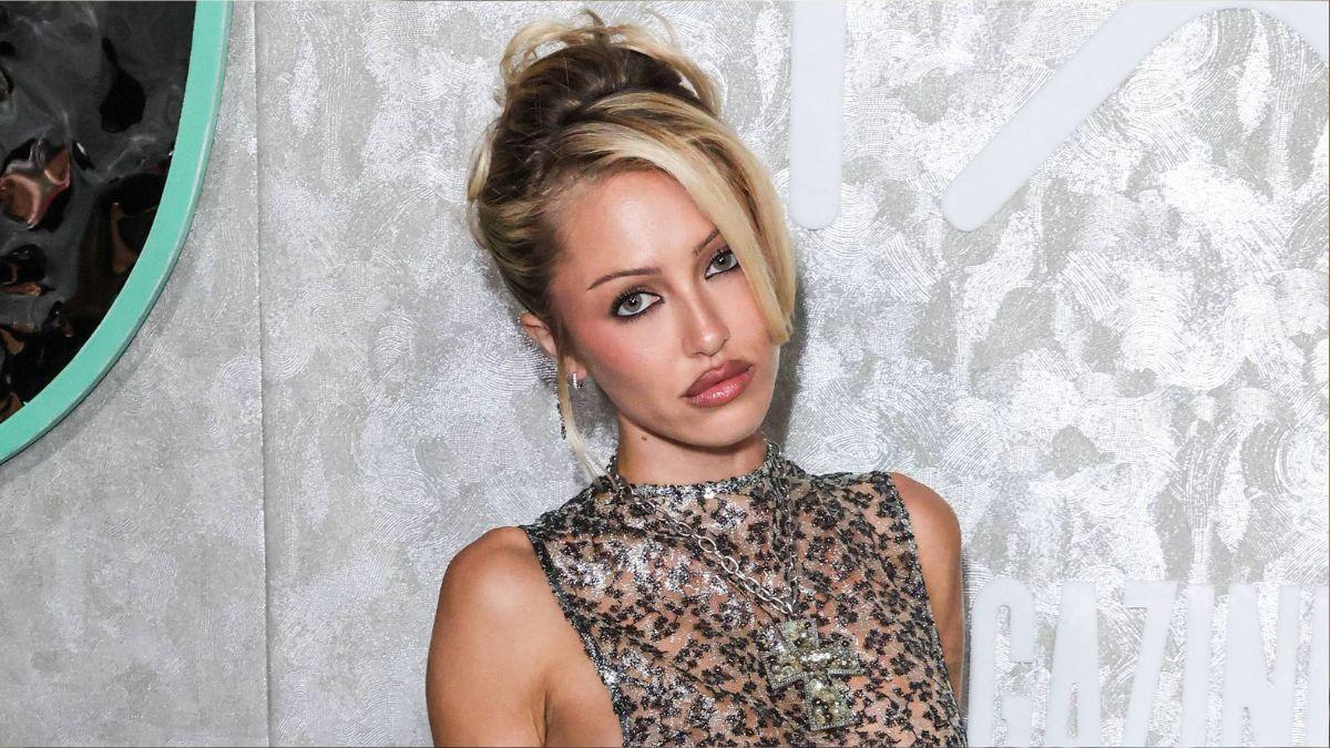 image of She lounged on the beach in a rainbow bikini.