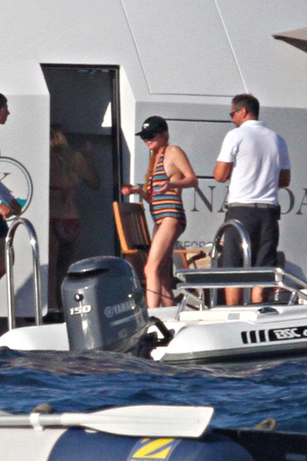 lindsay lohan pregnant baby bump one piece bathing suit