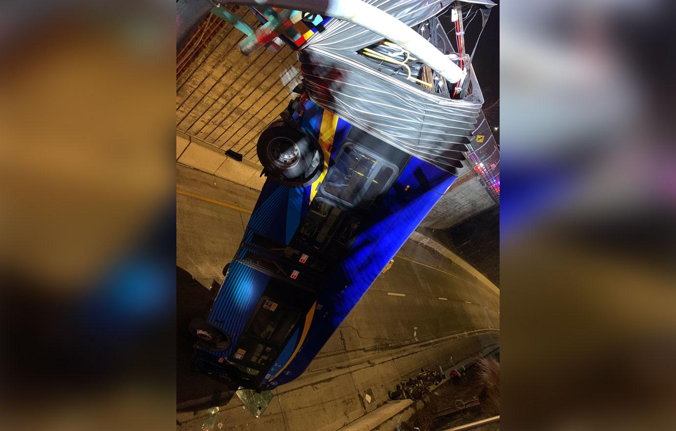 nyc bus hangs off overpass accident injuries