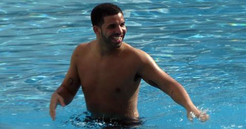 Shirtless drake hangs out drinks mystery woman