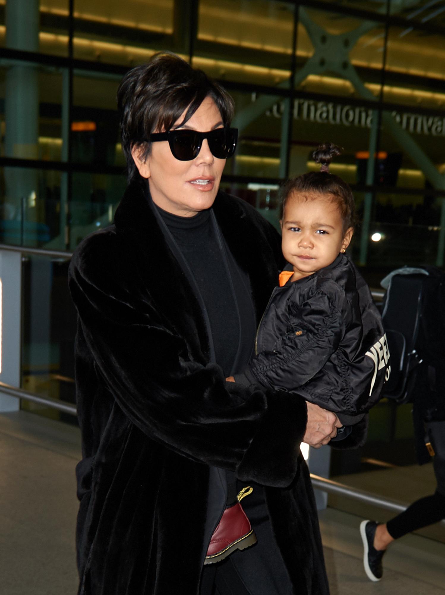 Kris Jenner and baby North West at Heathrow Airport