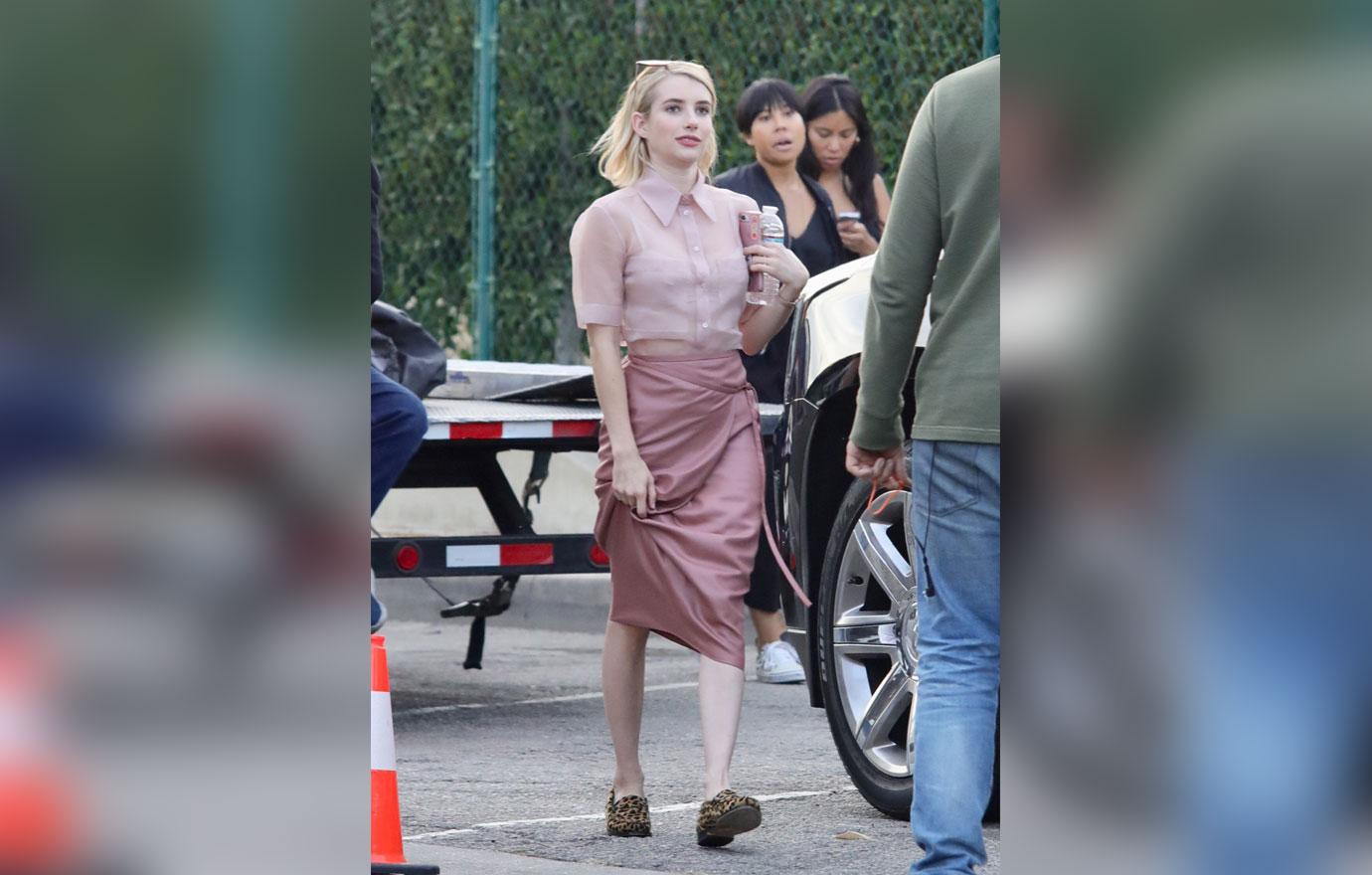 EXCLUSIVE: Emma Roberts see filming scenes in a vintage convertible