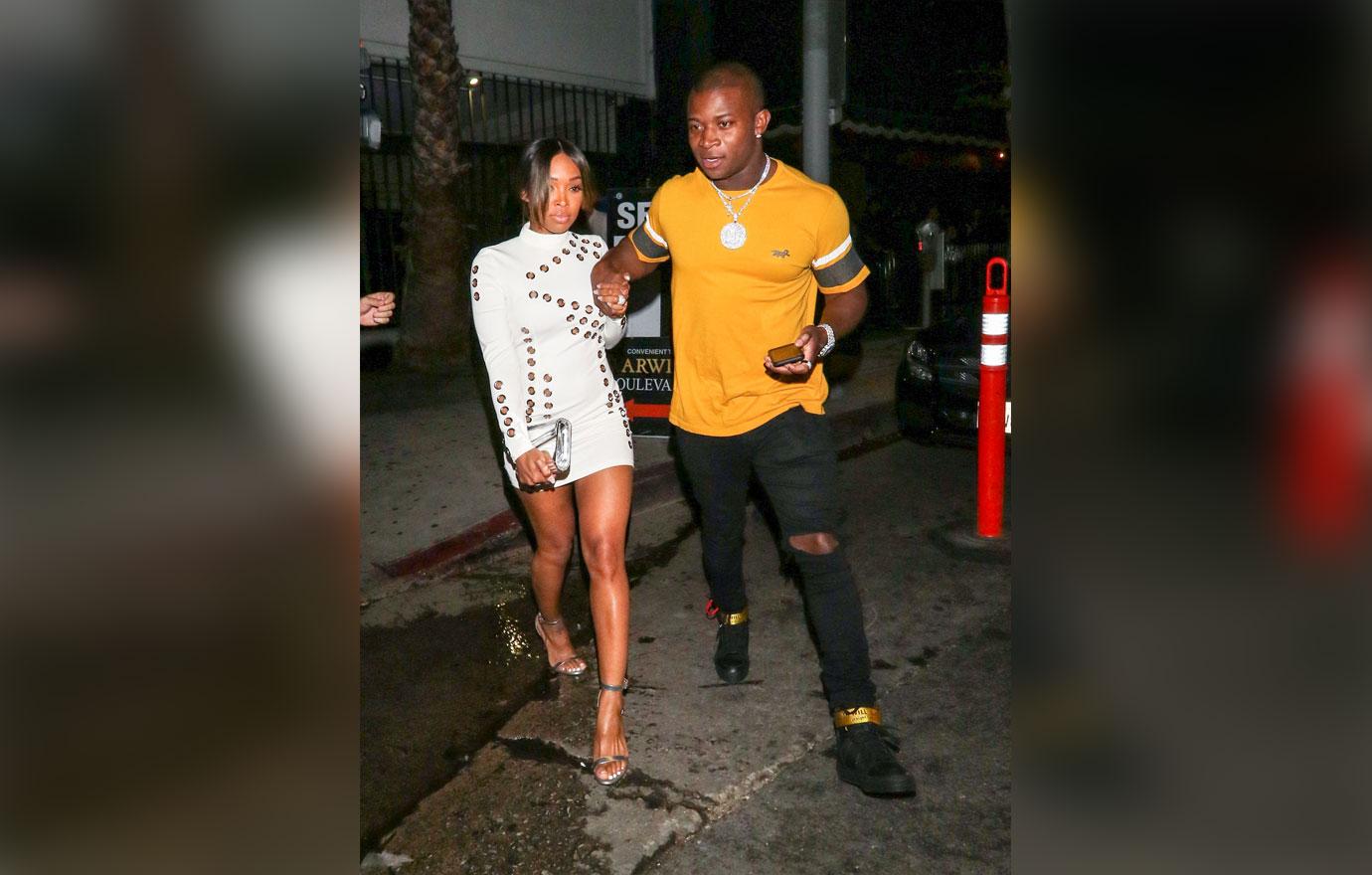 Malika Haqq And O.T. Genasis Walking On Street