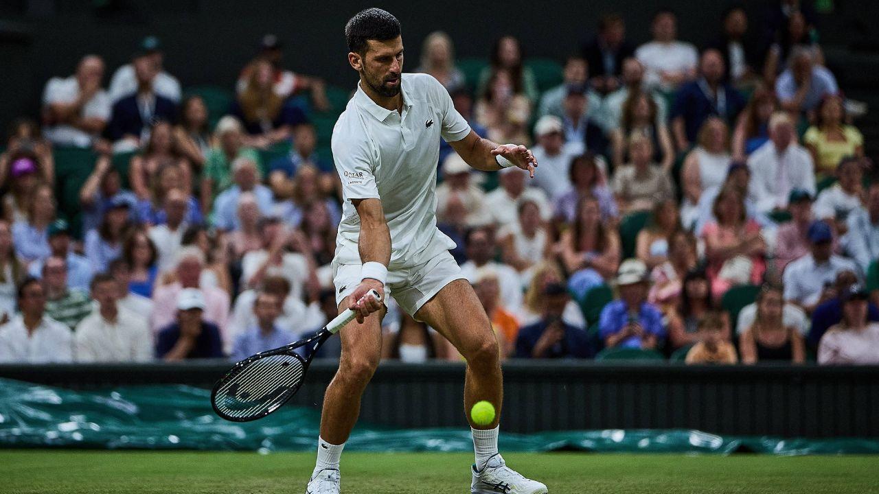 Image of Fans inside Arthur Ashe Stadium rallied behind Djokovic as he visibly struggled to finish the match.