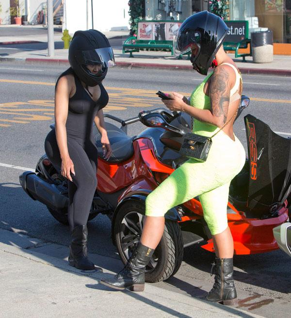 Amber rose blac chyna wearing body suits riding motorcycles 06