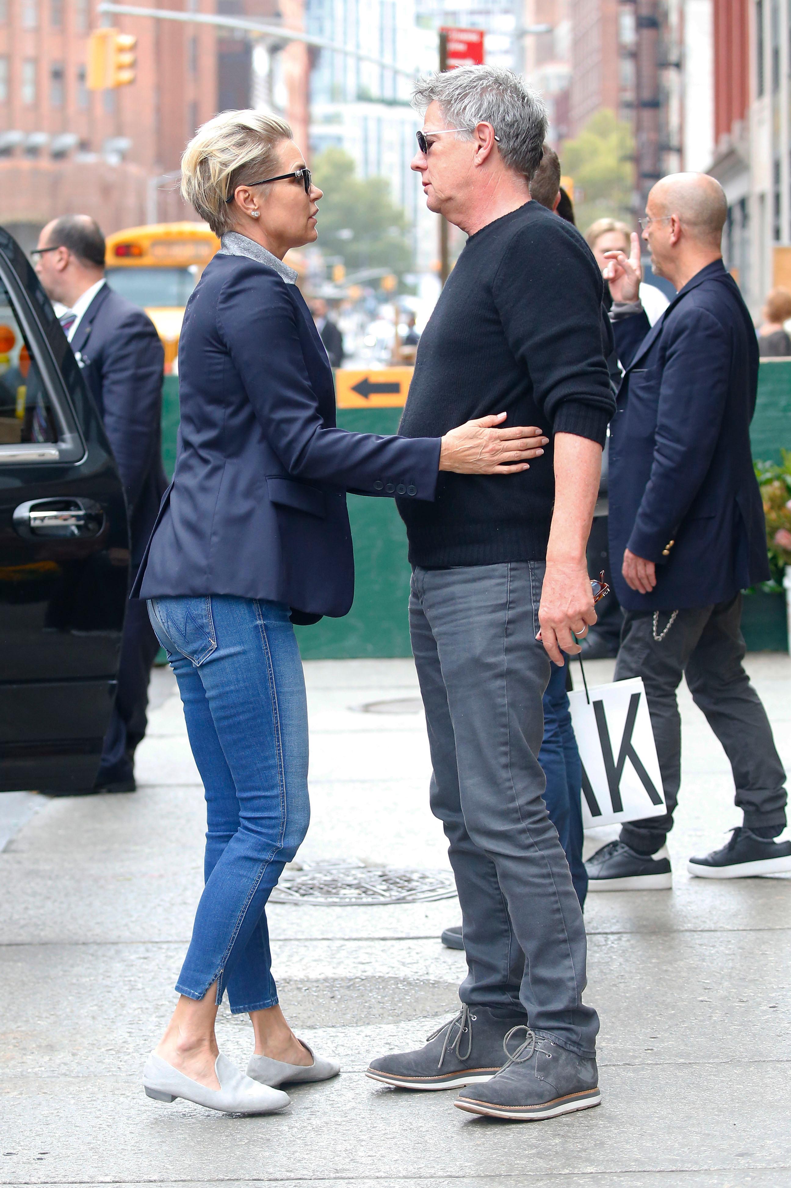 Yolanda Foster and David Foster hug and kiss on the street in New York City