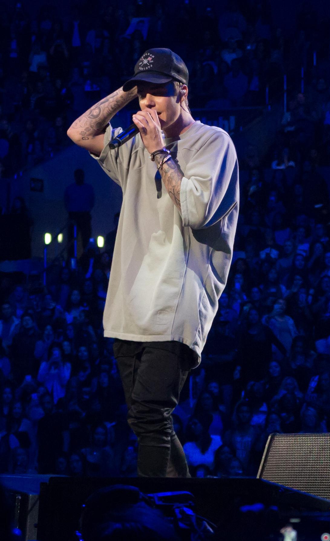 Justin Bieber performs a few acoustic songs during An Evening with Justin Bieber To Celebrate The Release of Purpose show at the Staples Center in Los Angeles, CA