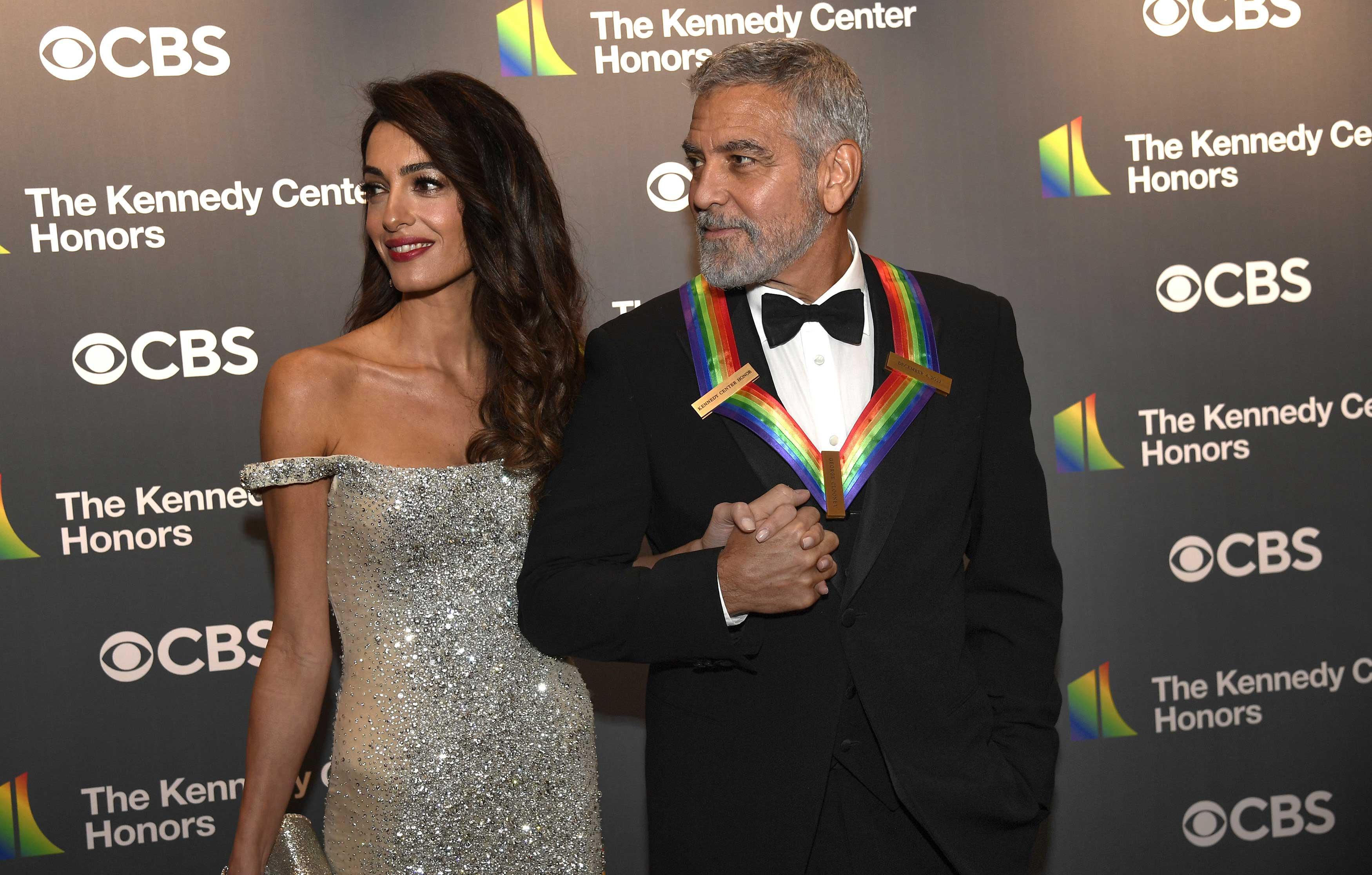 kennedy center honoree george clooney arrives on the red carpet