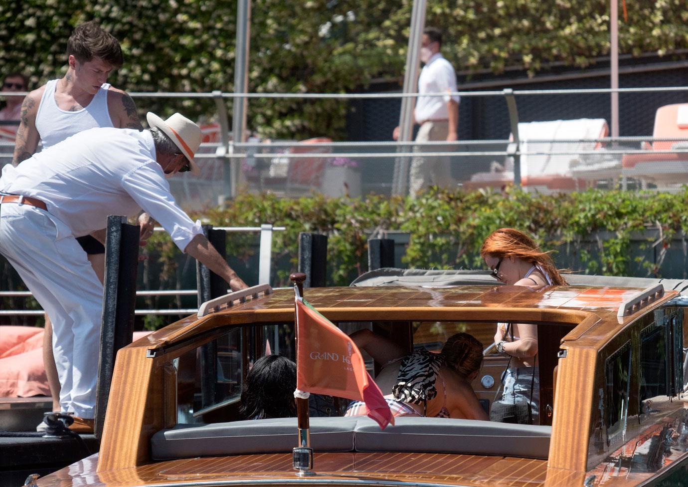 ella thorne and benji mascolo boating on lake como