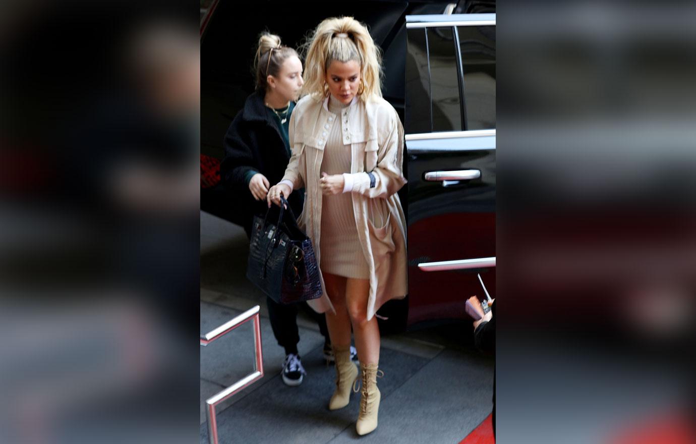 A pregnant Khloe Kardashian is seen arriving at a hotel for a meeting