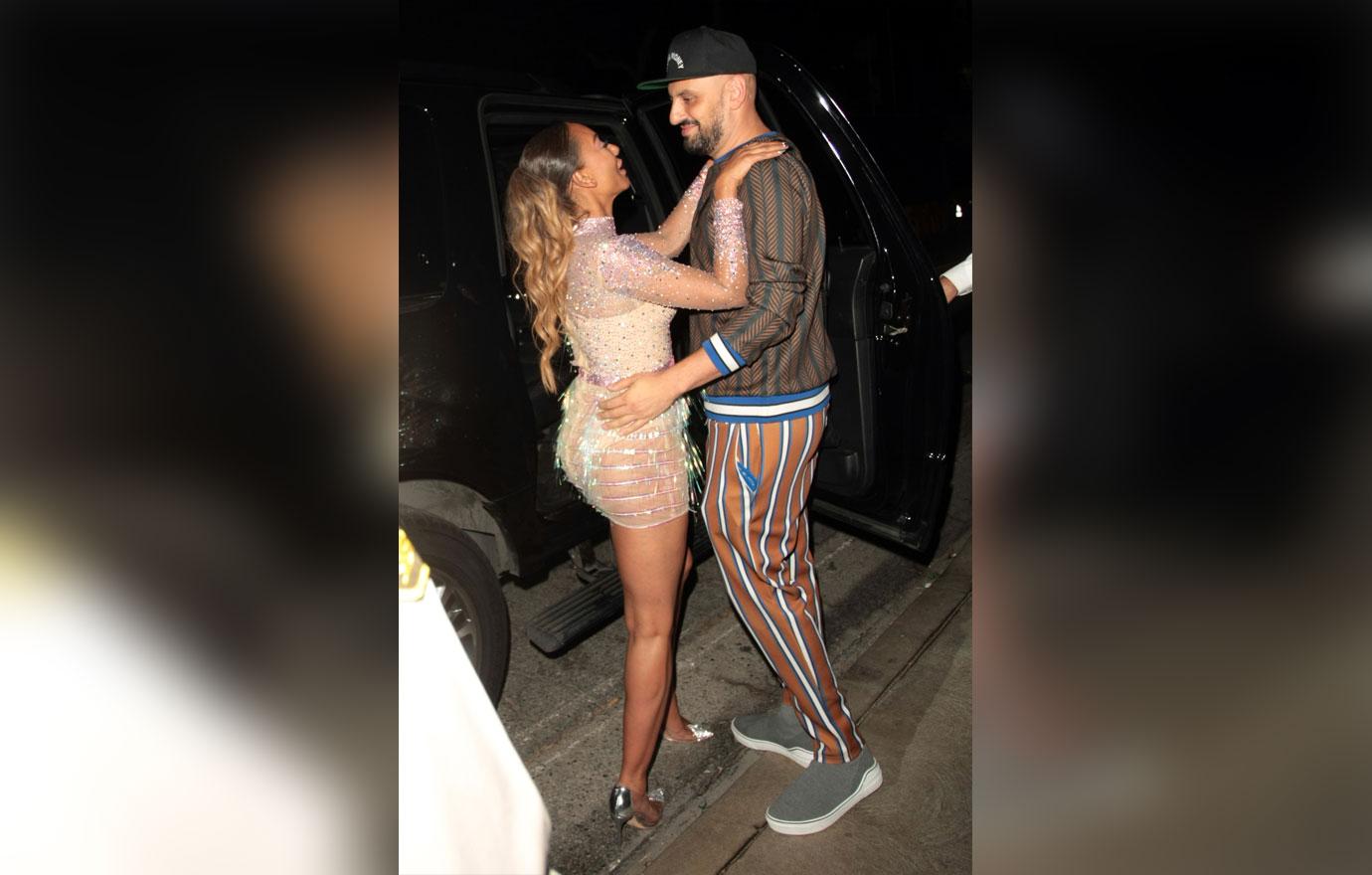 Mel B passionately kisses her boyfriend, Gary Madatyan as they leave Simon Cowell&#8217;s party