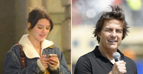 Photo of Suri Cruise and Tom Cruise.