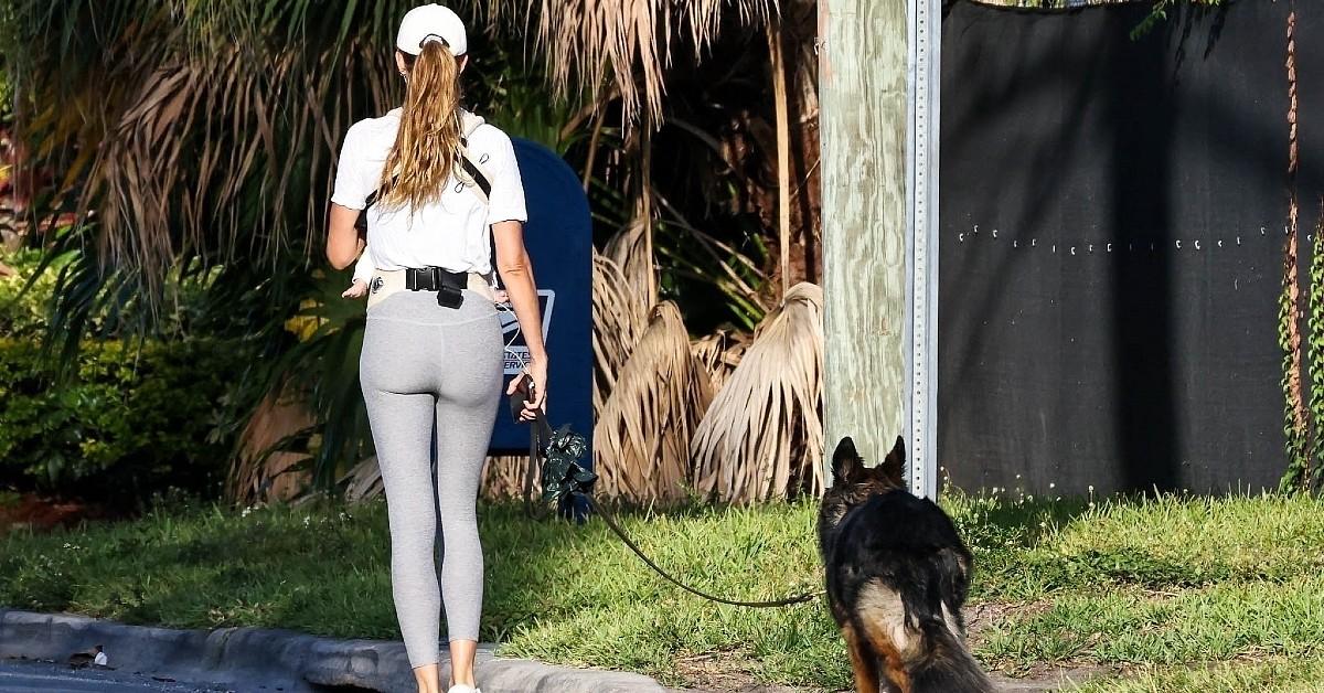 gisele walks baby and dog in miami