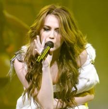2009__11__wenn_miley1 224×225.jpg