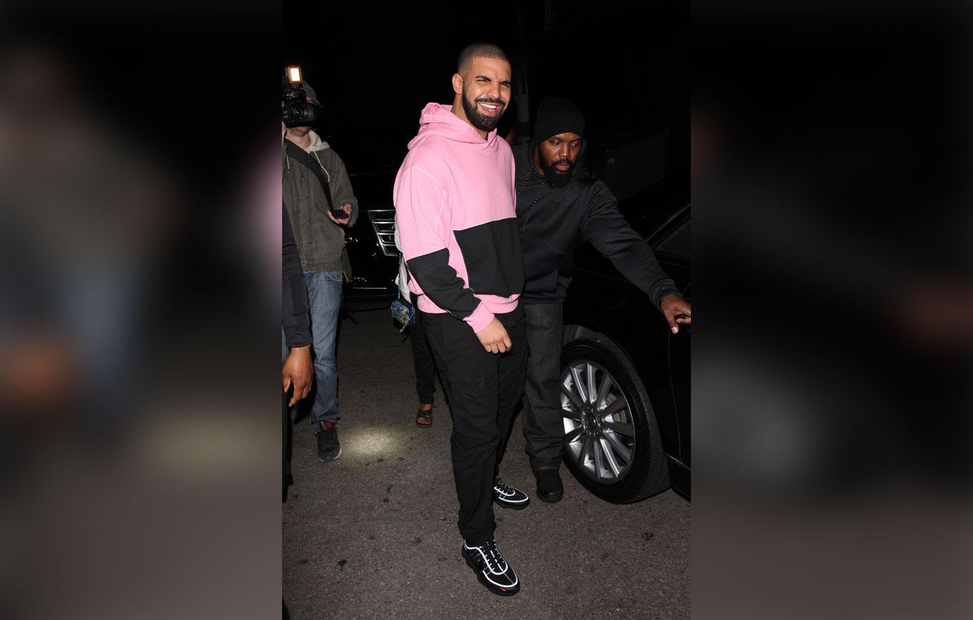 Drake in pink hoodie