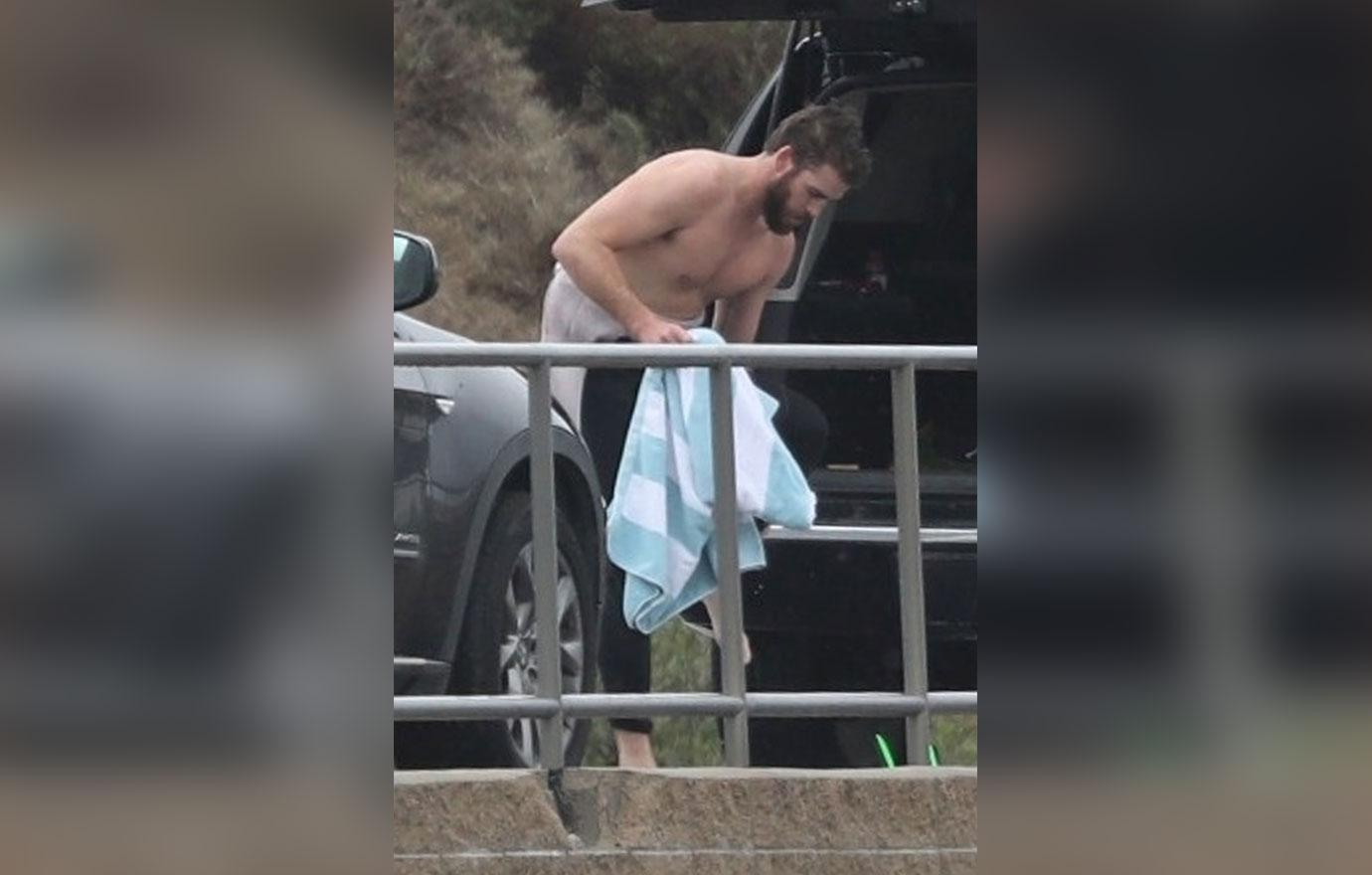 *EXCLUSIVE* Liam Hemsworth strips off after surfing in Malibu