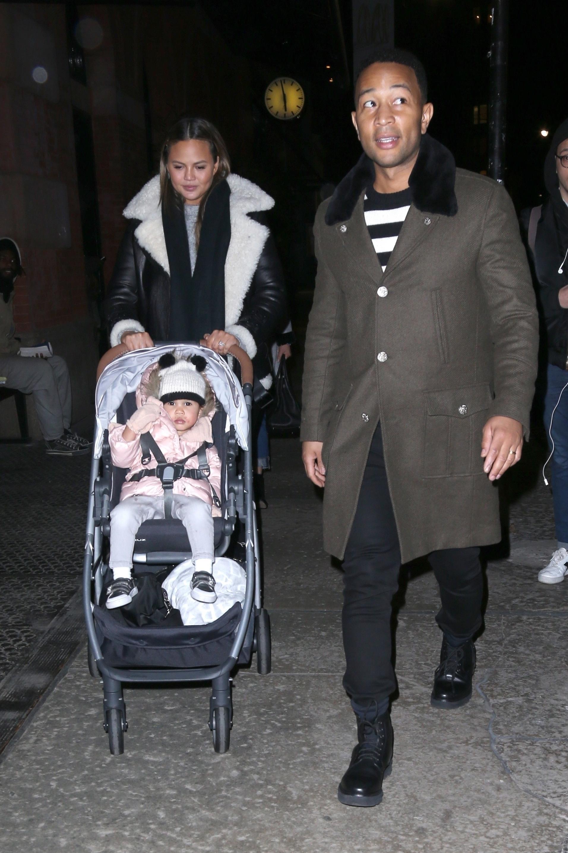 Chrissy Teigen and John Legend take Luna out for Lure Fishbar