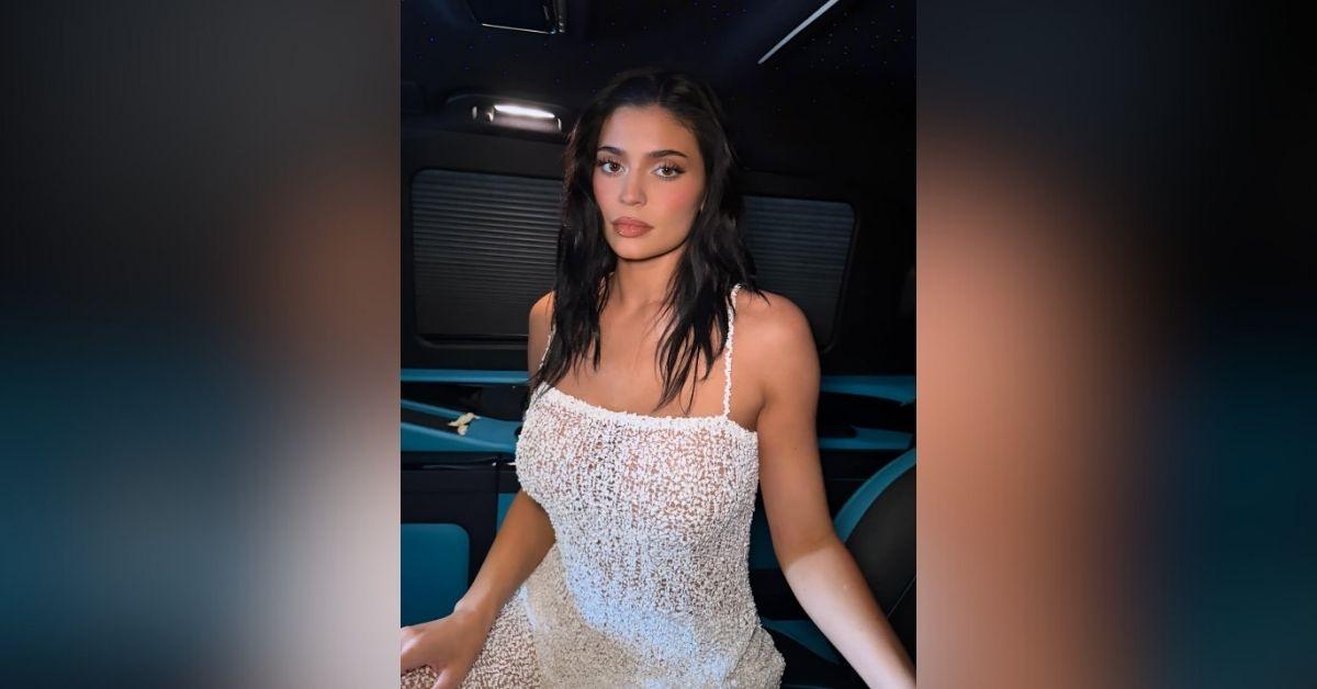 image of The mom-of-two's see-through white dress showed off her matching lingerie.