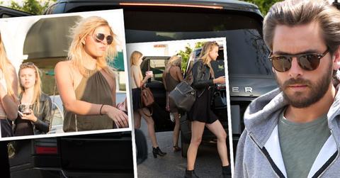 Scott disick loads supermodels into car