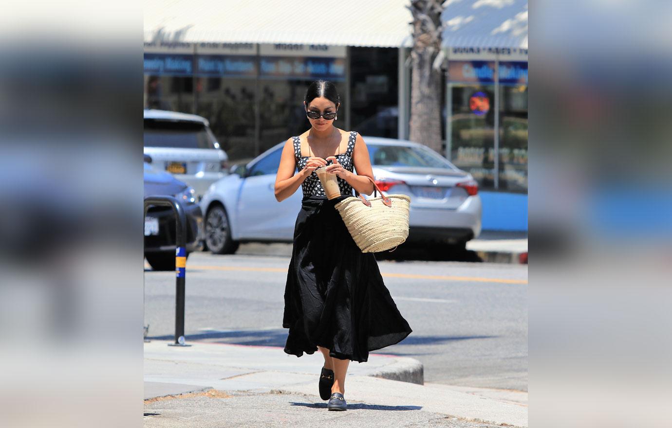 Vanessa Hudgens] Stuns In Ruffled Skirt After Romantic Tropical