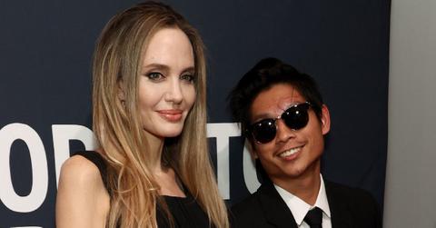 Photo of Pax Jolie-Pitt and Angelina Jolie.