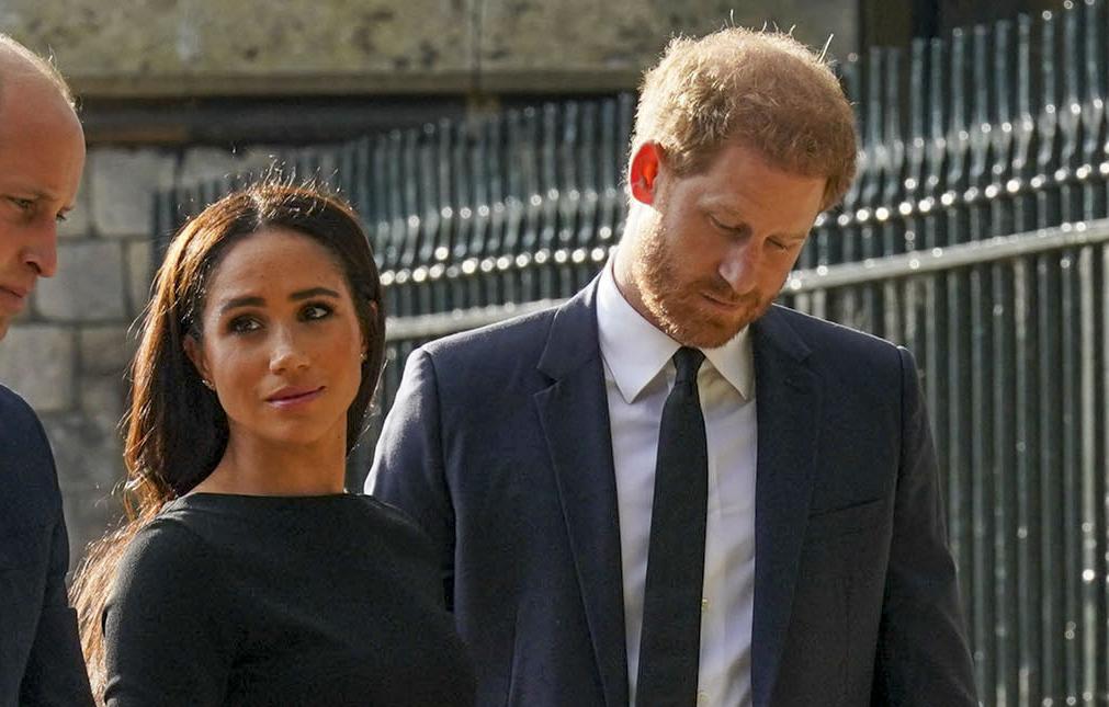 prince harry meghan markle pack on pda in royal photograph