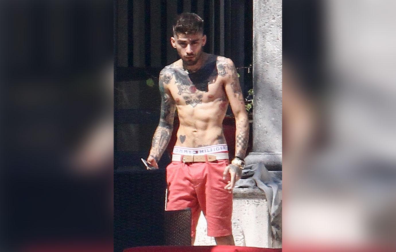 Zayn Malik looks extremely thin as he chain smokes by the pool after split from Gigi Hadid