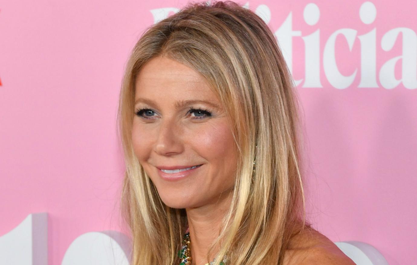 Gwyneth Paltrow was back in black in a shoulder-less dark, floor-length dress at the premiere of her new Netflix show.