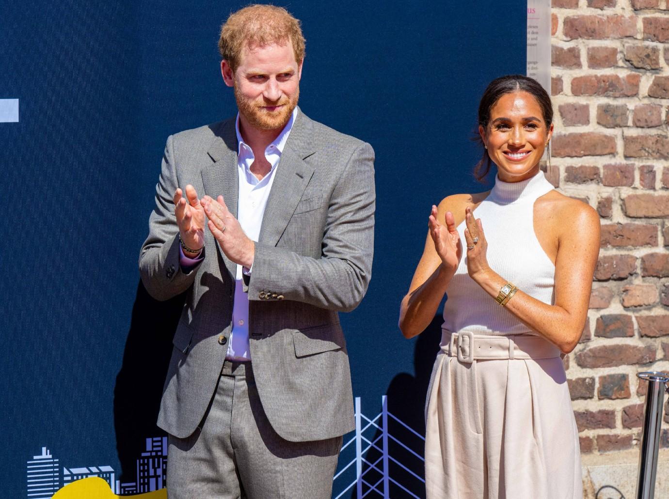 is meghan markle signing deal dior after spotify canceled podcast