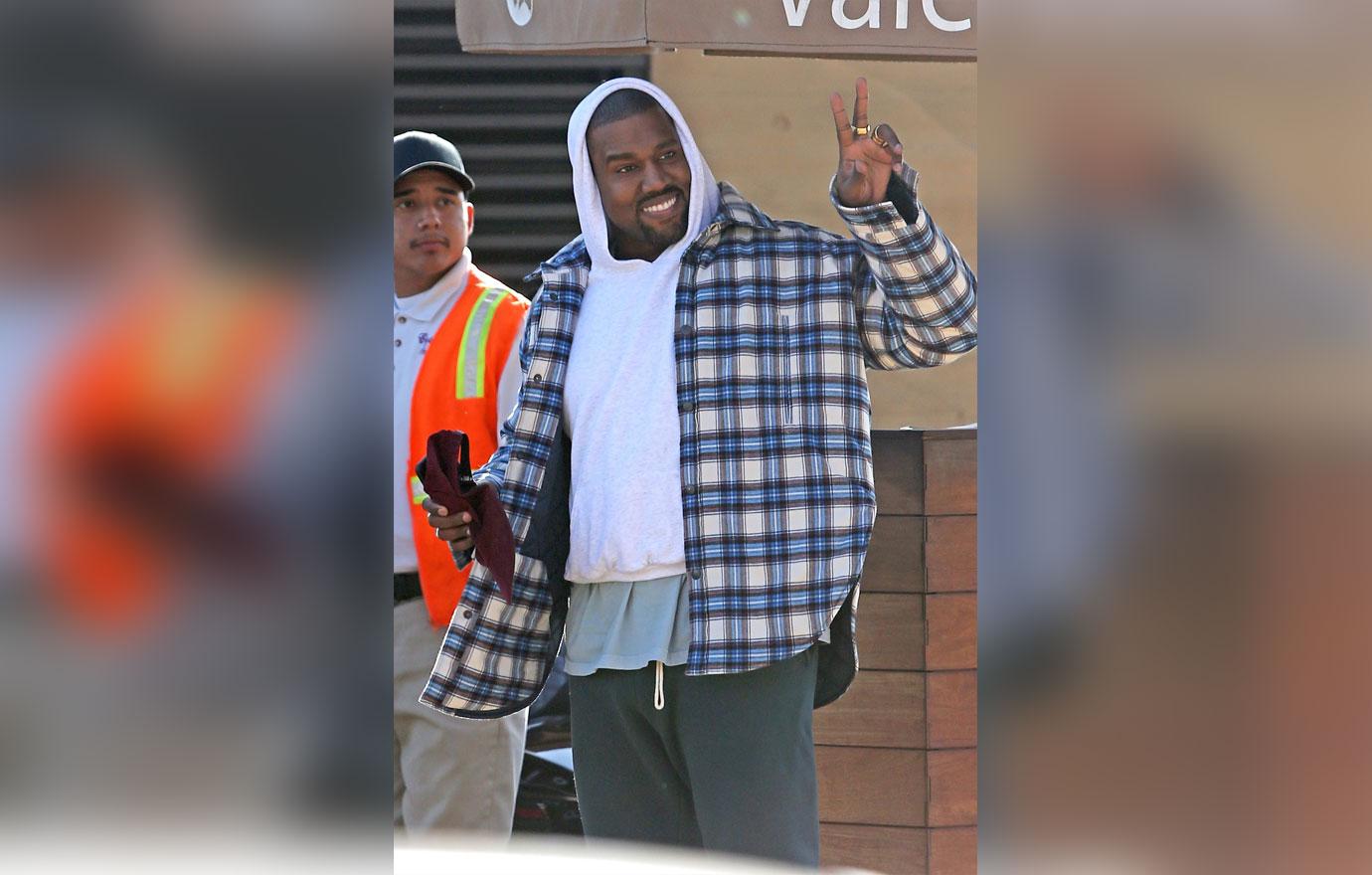 Kanye West Smiles Nobu